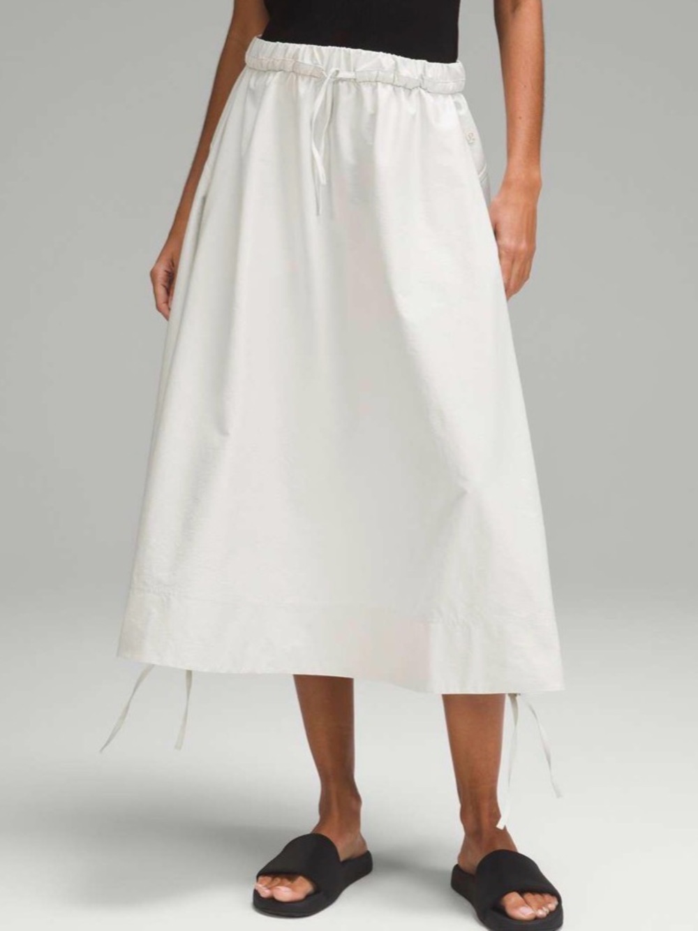 62. Size Large LULULEMON Ivory High Rise Side Slit Skirt - Picture 8 of 8
